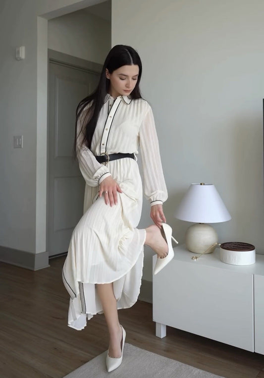 Elegant White Pleated Dress with Black Trim